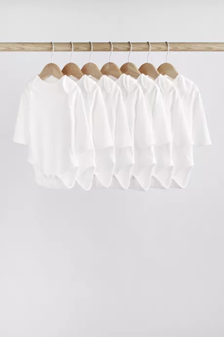 Buy White 7 Pack Essential Baby Long Sleeve Bodysuits from Next Germany